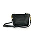 Studio pothos Cosmos bag in black with brass hardware.