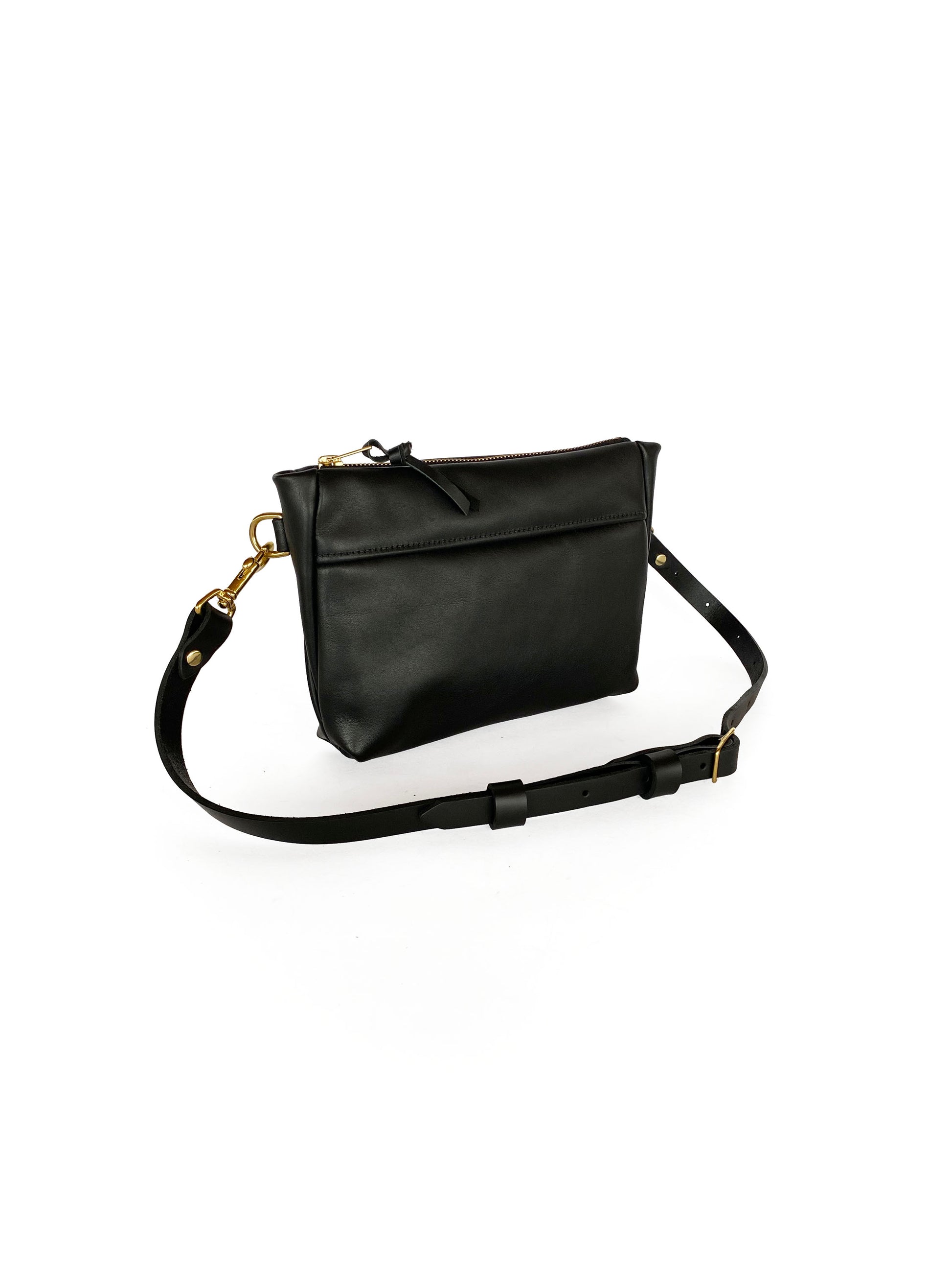 Studio pothos Cosmos bag in black with brass hardware.