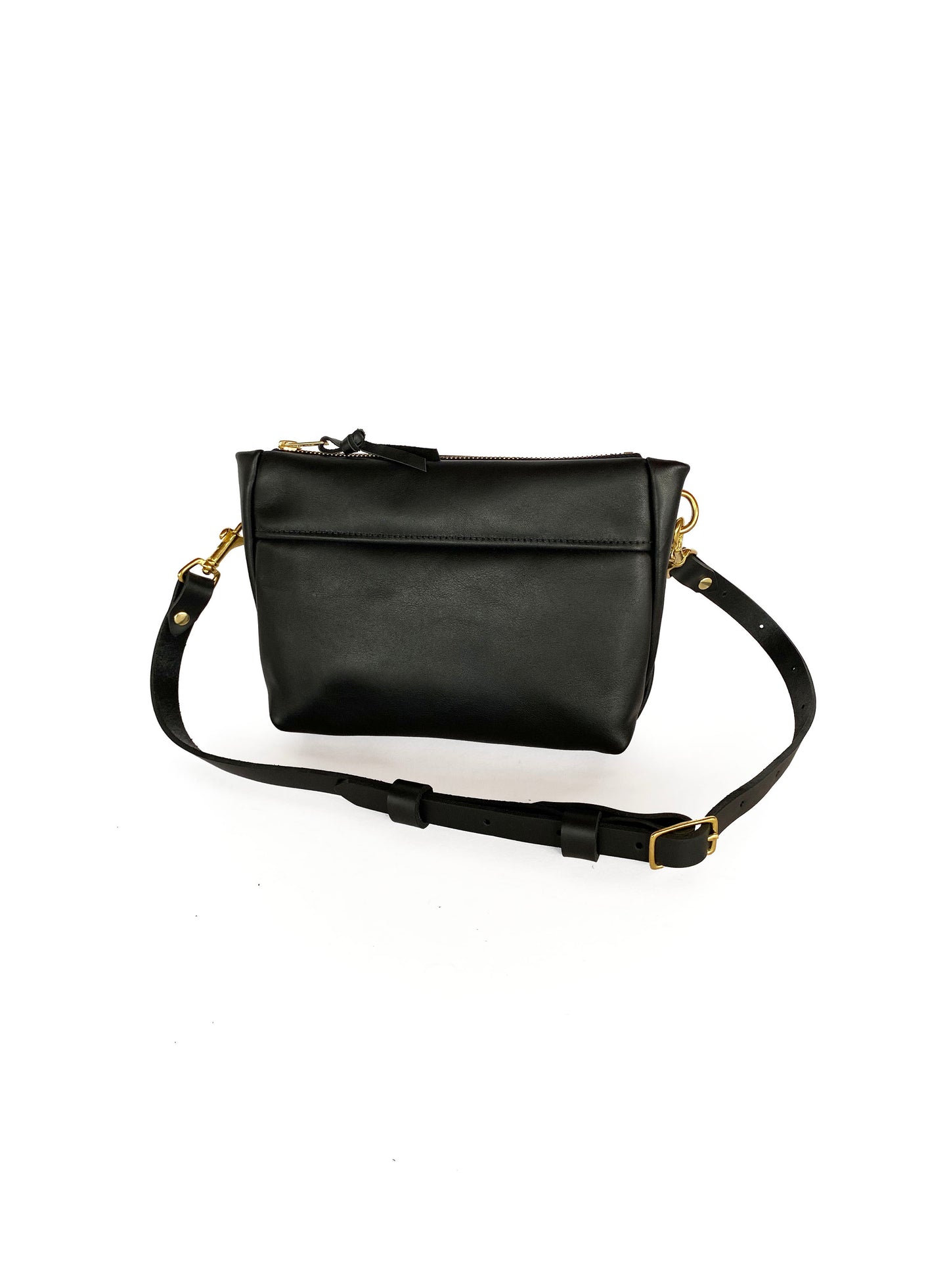 Studio pothos Cosmos bag in black with brass hardware.